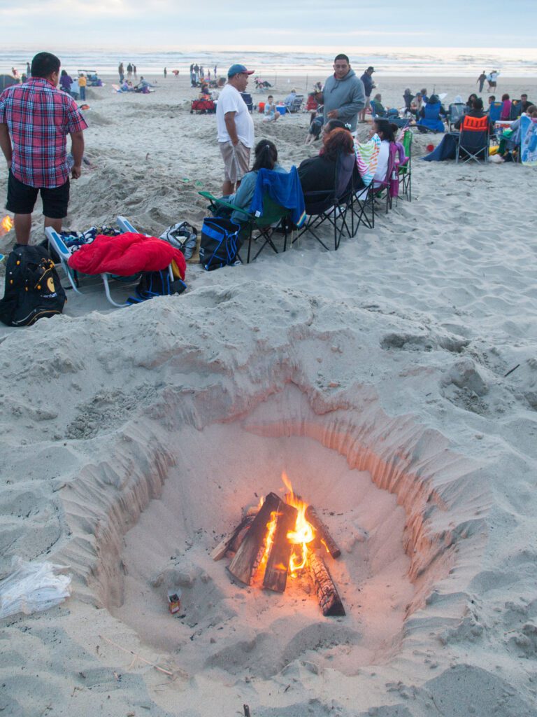 beach gathering campfire