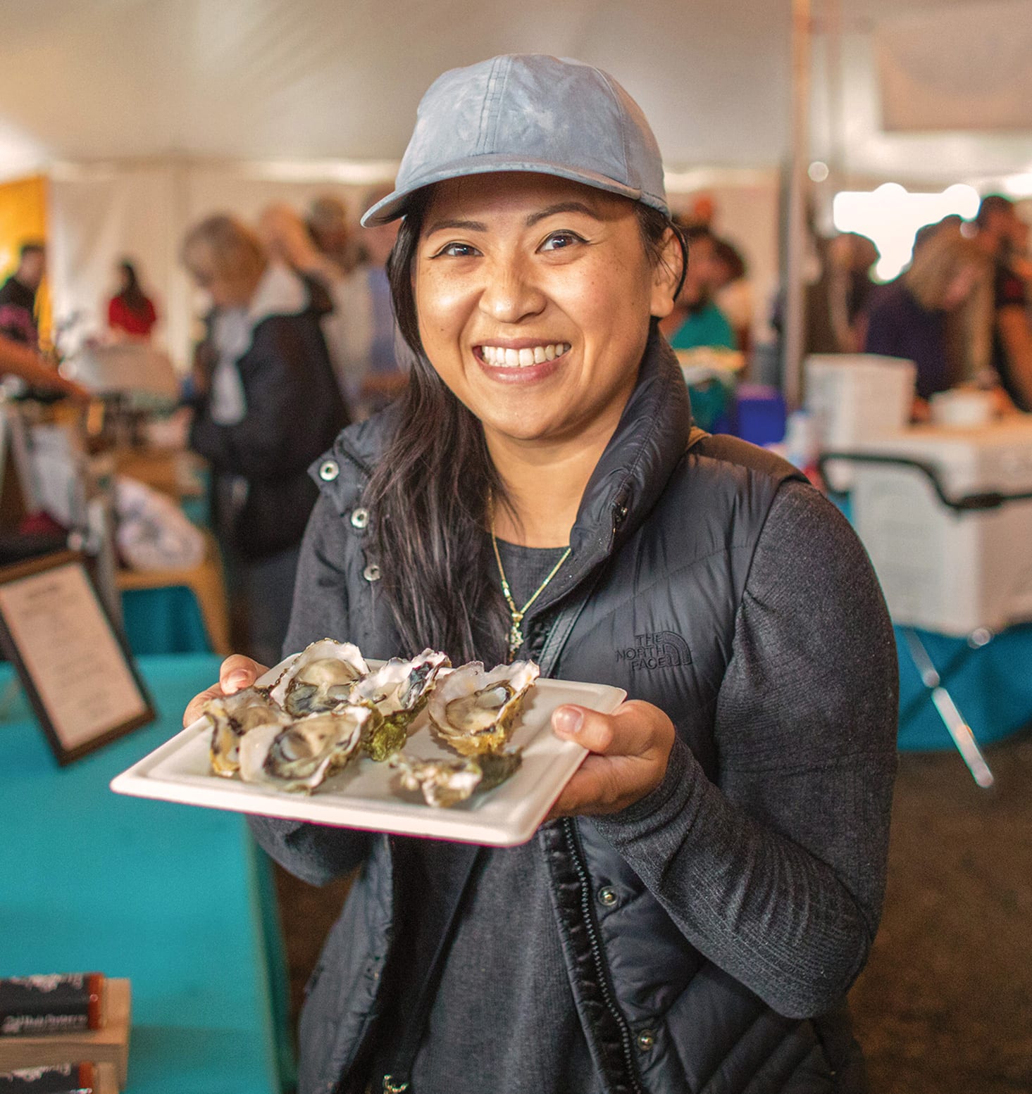 woman with platter of oysters