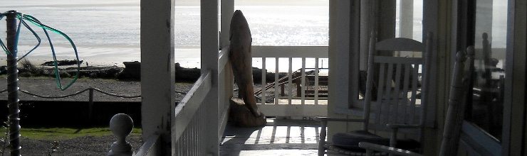 Porch with chairs overlooking the beach