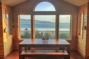 Big windows looking out onto the beach