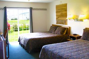 Two beds in a hotel room